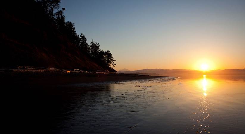 Looks out over Port Susan Bay in Puget Sound, Washington. Natural shorelines with bluffs are important for feeding sediment into Puget Sound. 