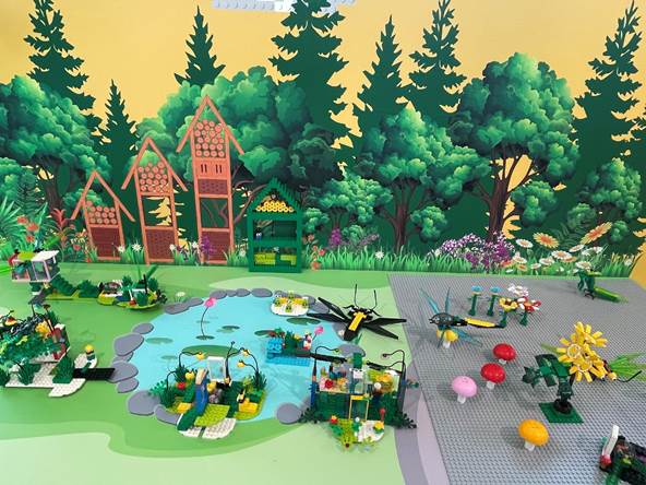 A picture containing tree, toy, colorful
Description automatically generated